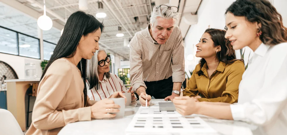 team members working collaboratively in a meeting room included in Park Suites' office address rental package in Singapore