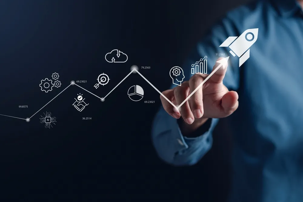 man touching a rocket icon signifying business growth