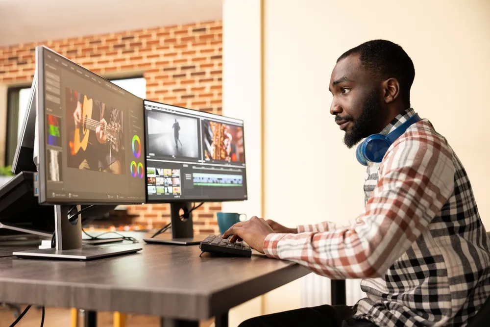 a man working at home, editing videos