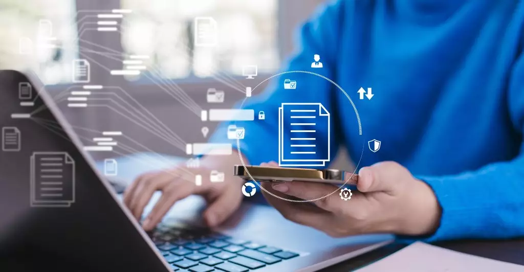 a woman using her laptop and mobile phone in her meeting set up in her virtual office space in singapore